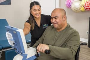 A rehab therapist and a resident at La Mesa facility